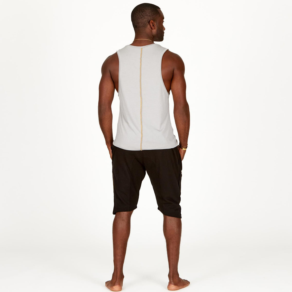 A man modeling black milanos mid shorts
