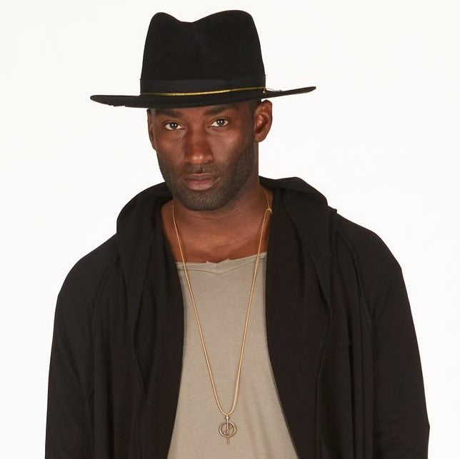 Male modeling OGT Bespoke Hat with 108 Talisman