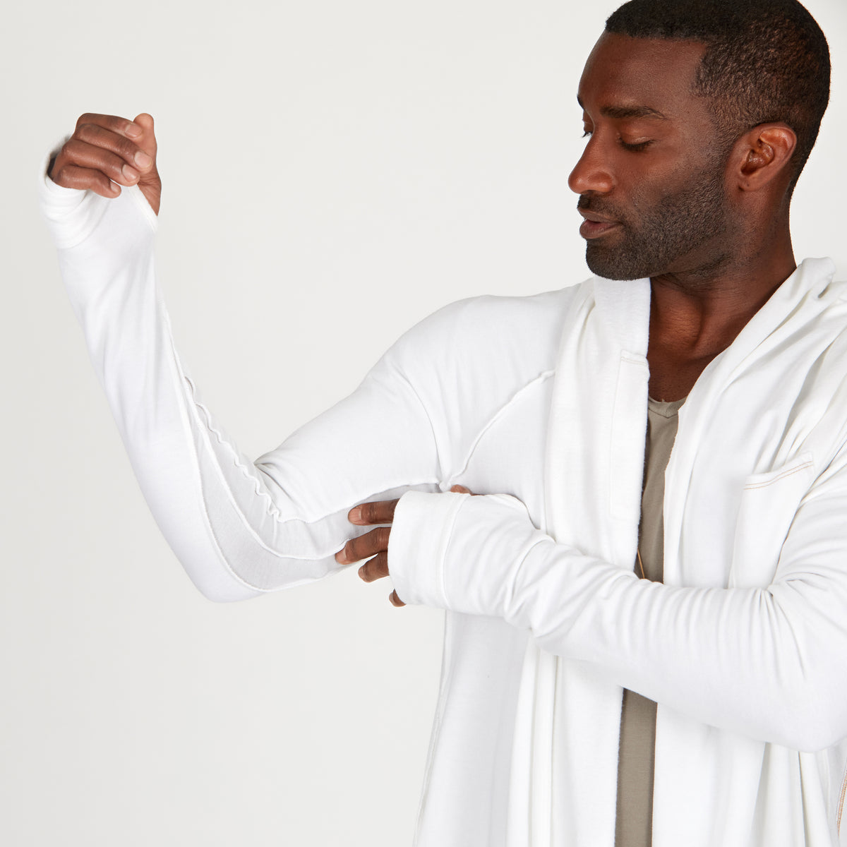 Male modeling white kairos duster