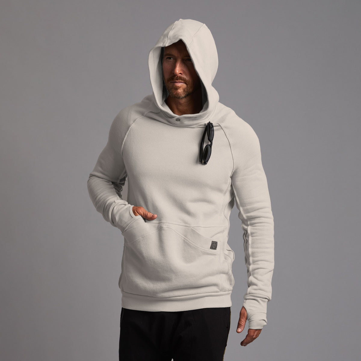 male modeling hoodie in white stone