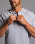 Man modeling a Blue Clay colored Short Sleeve Henley shirt