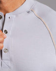 Man modeling a Blue Clay colored Short Sleeve Henley shirt