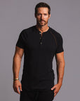 Man modeling a black Short Sleeve Henley shirt