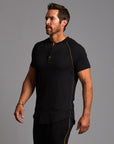 Man modeling a black Short Sleeve Henley shirt
