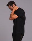 Man modeling a black Short Sleeve Henley shirt