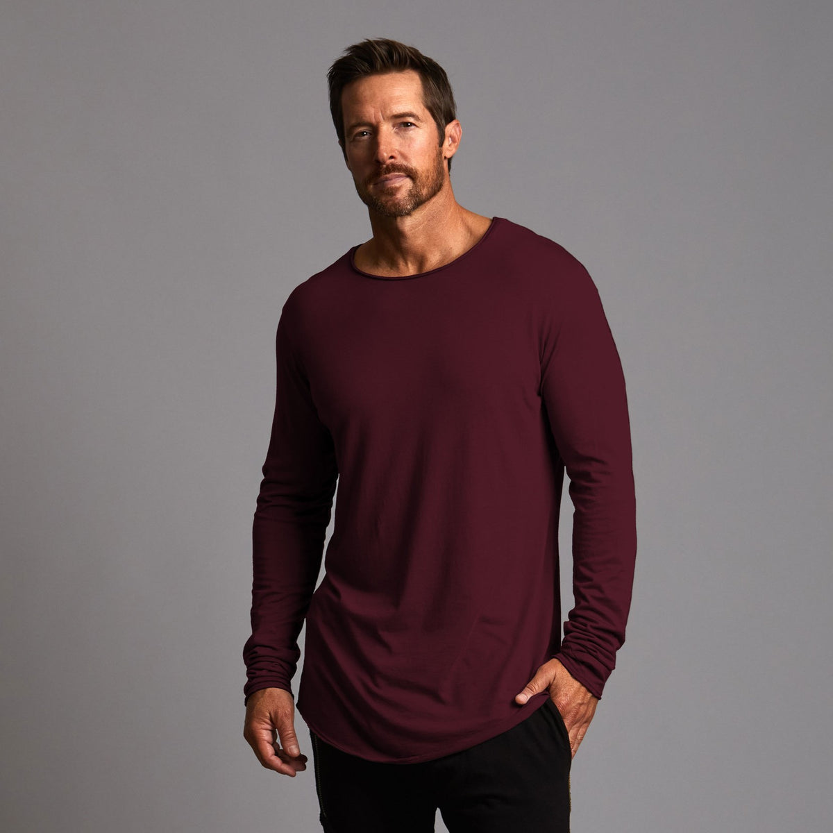 Male modeling burgundy long sleeve crew shirt