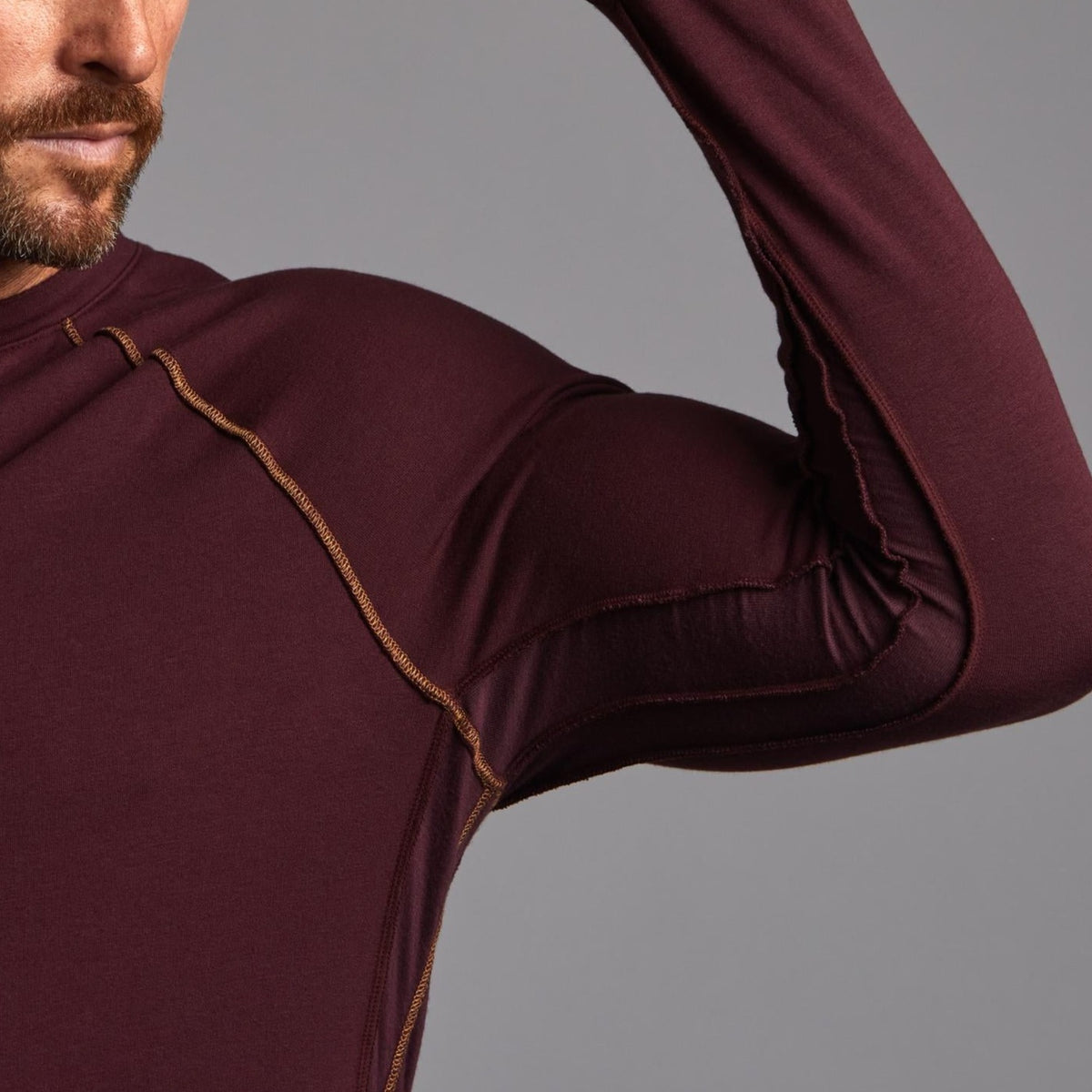 Male modeling red long sleeve raglan