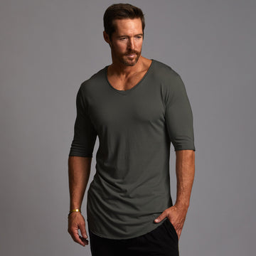 A man modeling Urban Forest crew tee