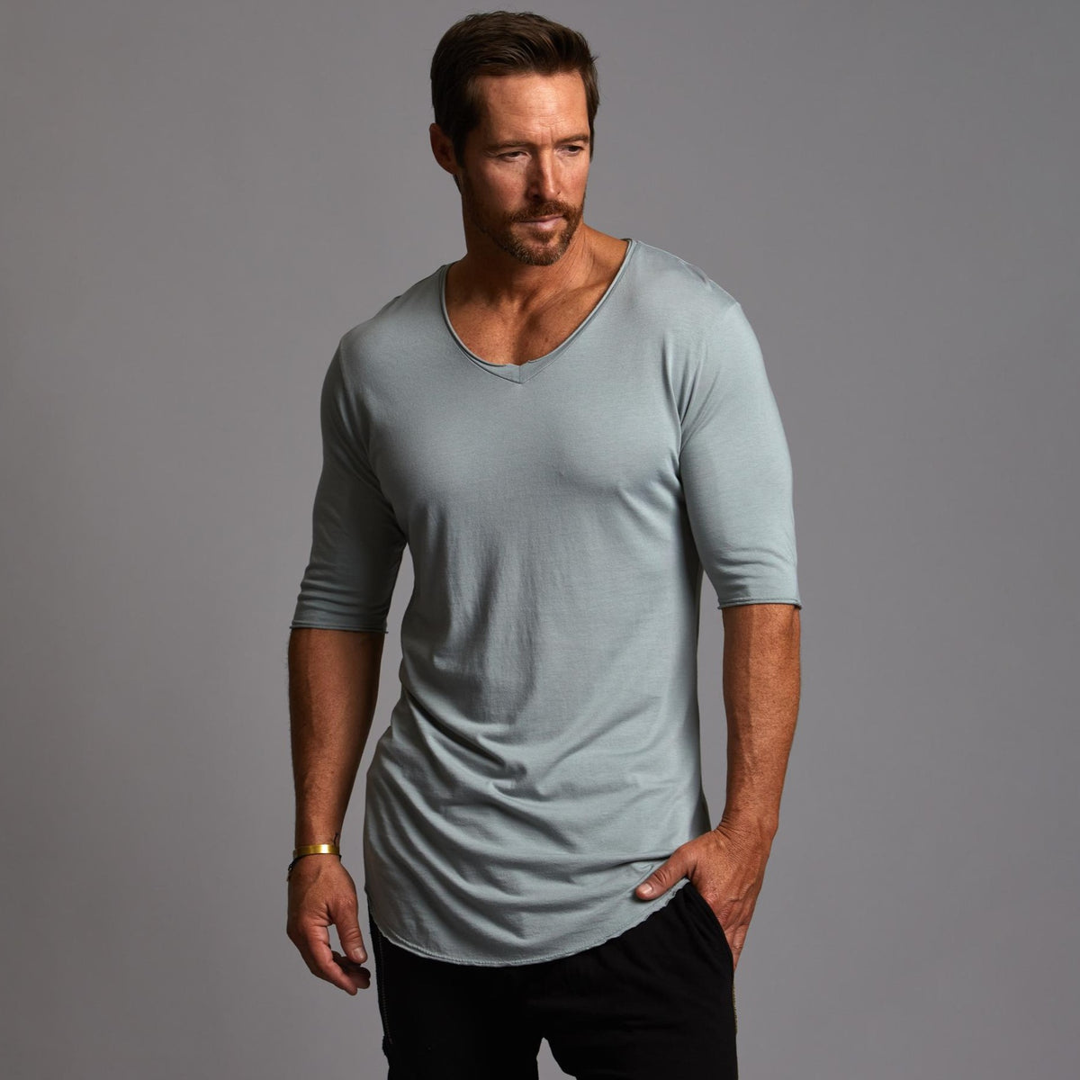 Male modeling an Agave colored V Neck Tree Shirt
