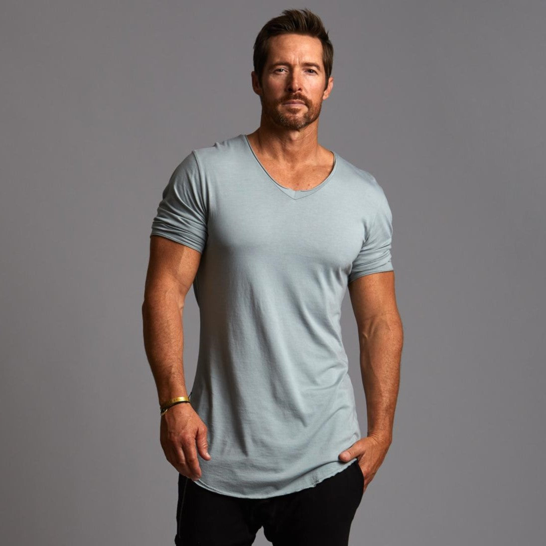 Male modeling an Agave colored V Neck Tree Shirt