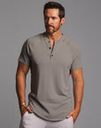 Man modeling a Deep Clay gray colored Short Sleeve Henley shirt