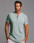 Man modeling a Agave colored Short Sleeve Henley shirt