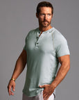 Man modeling a Agave colored Short Sleeve Henley shirt