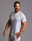 Man modeling a Blue Clay colored Short Sleeve Henley shirt