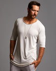 Male modeling white crew neck shirt 