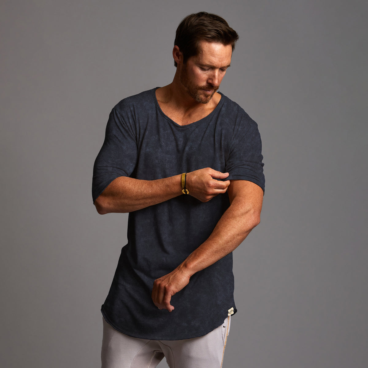 Male modeling tee in blue mineral