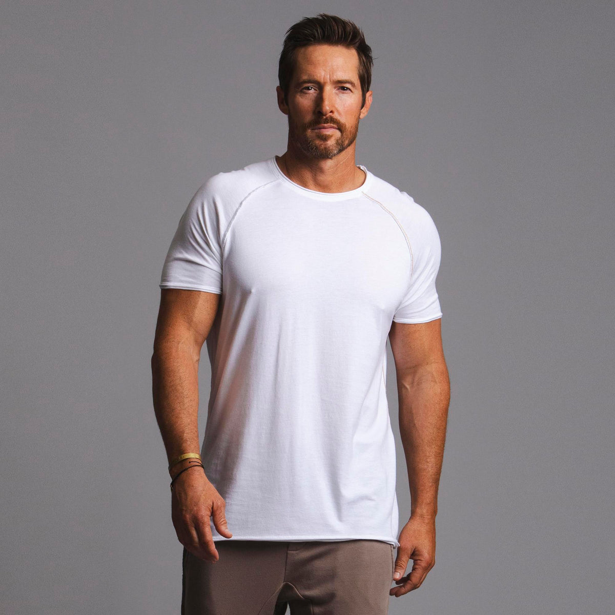 Male modeling white ultimate tee shirt