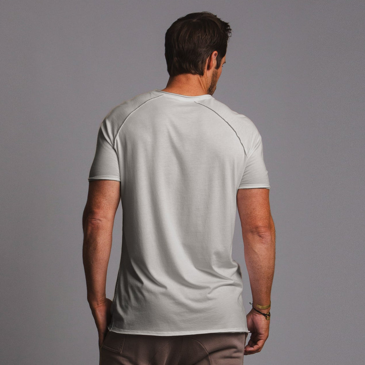 male modeling moonlight colored tee