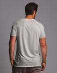 male modeling moonlight colored tee