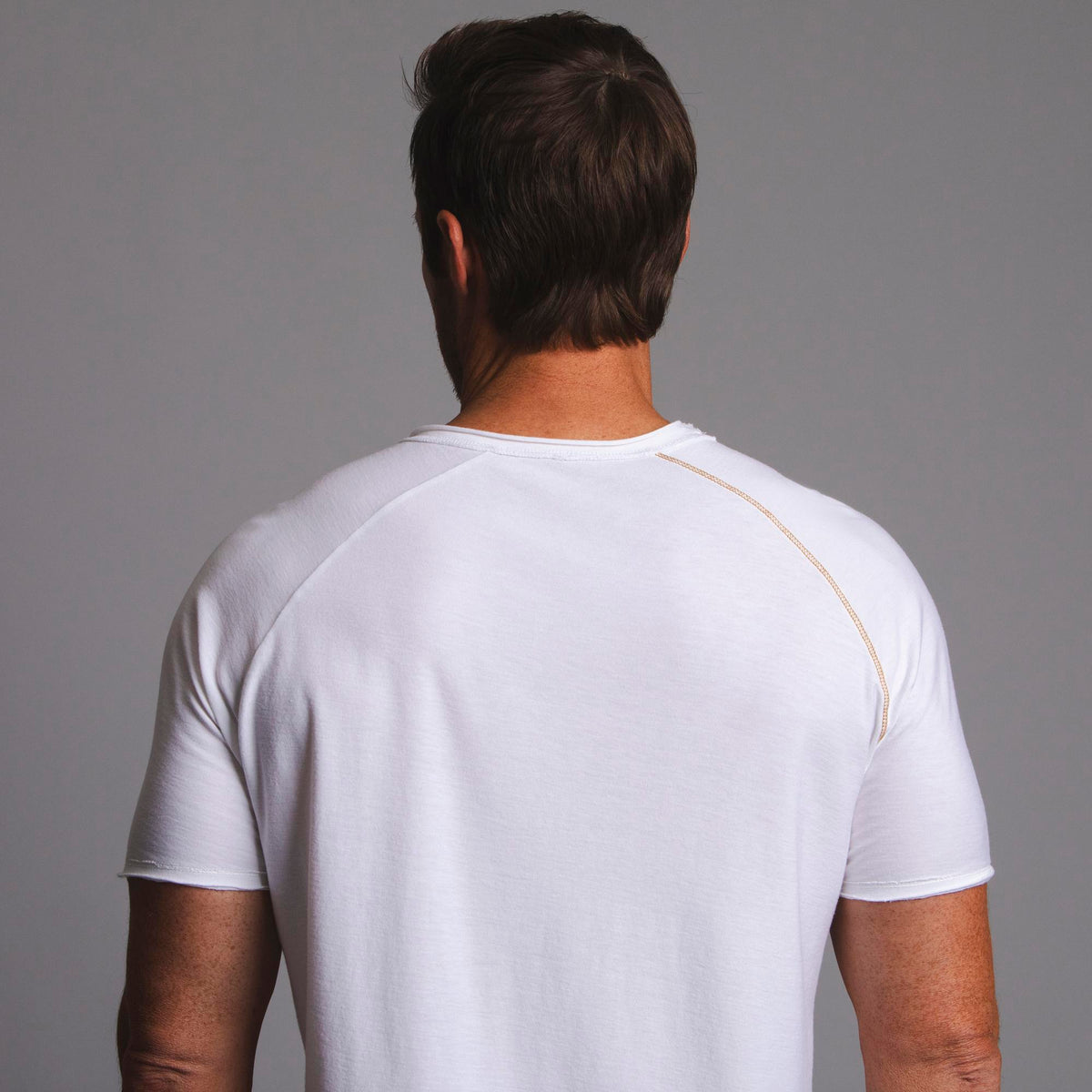 Male modeling white ultimate tee shirt