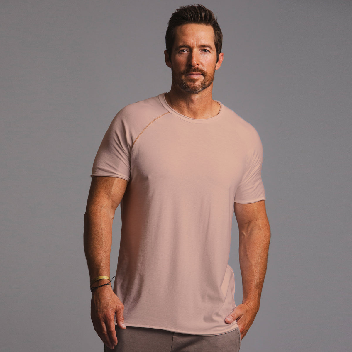 Male modeling pink ultimate tee shirt