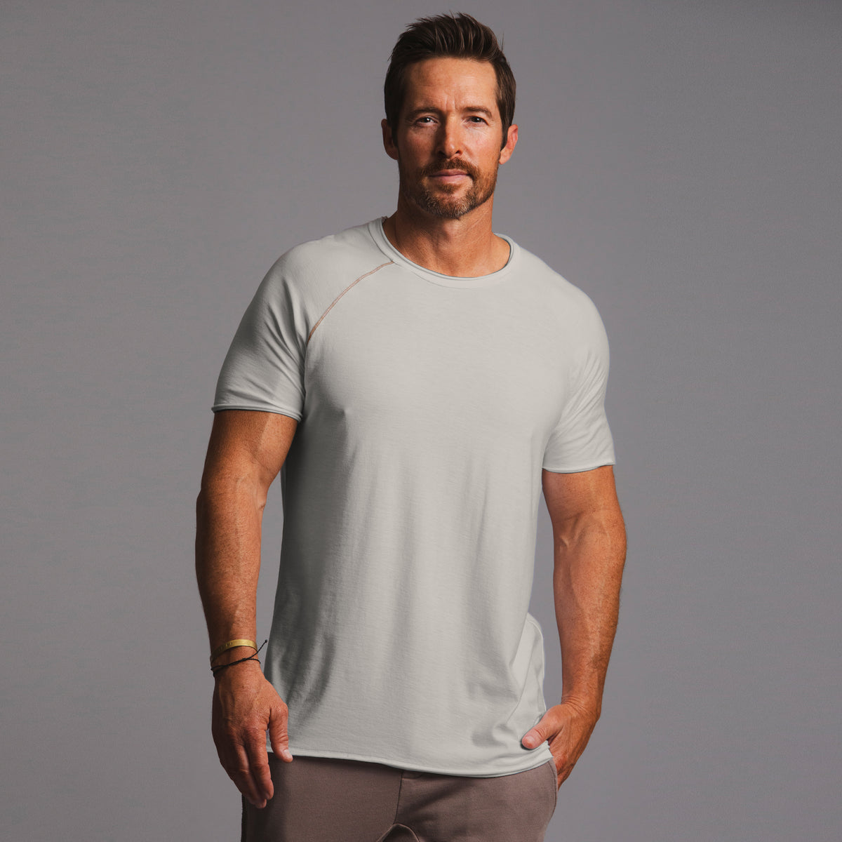 Male modeling silver ultimate tee shirt
