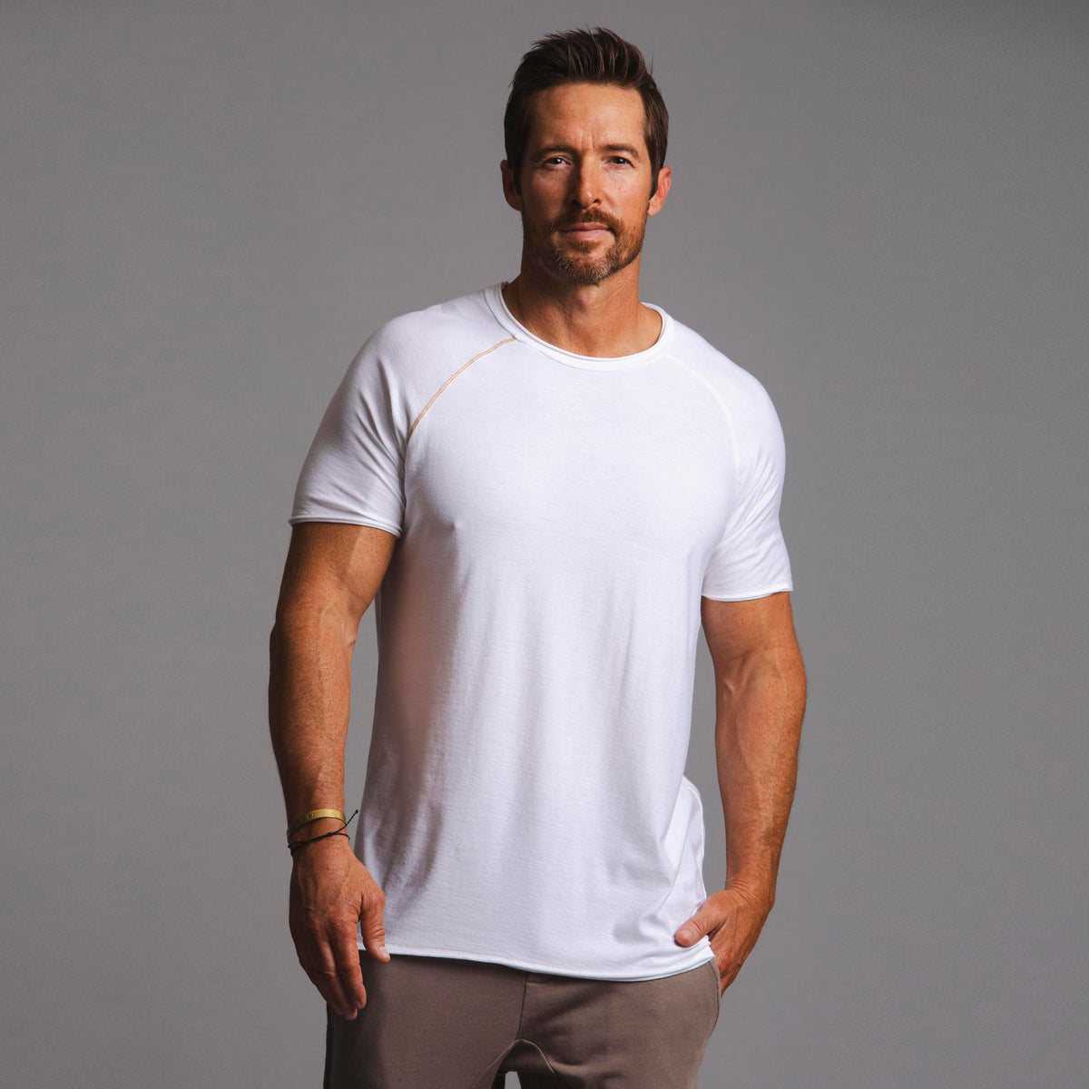 Male modeling white ultimate tree shirt 