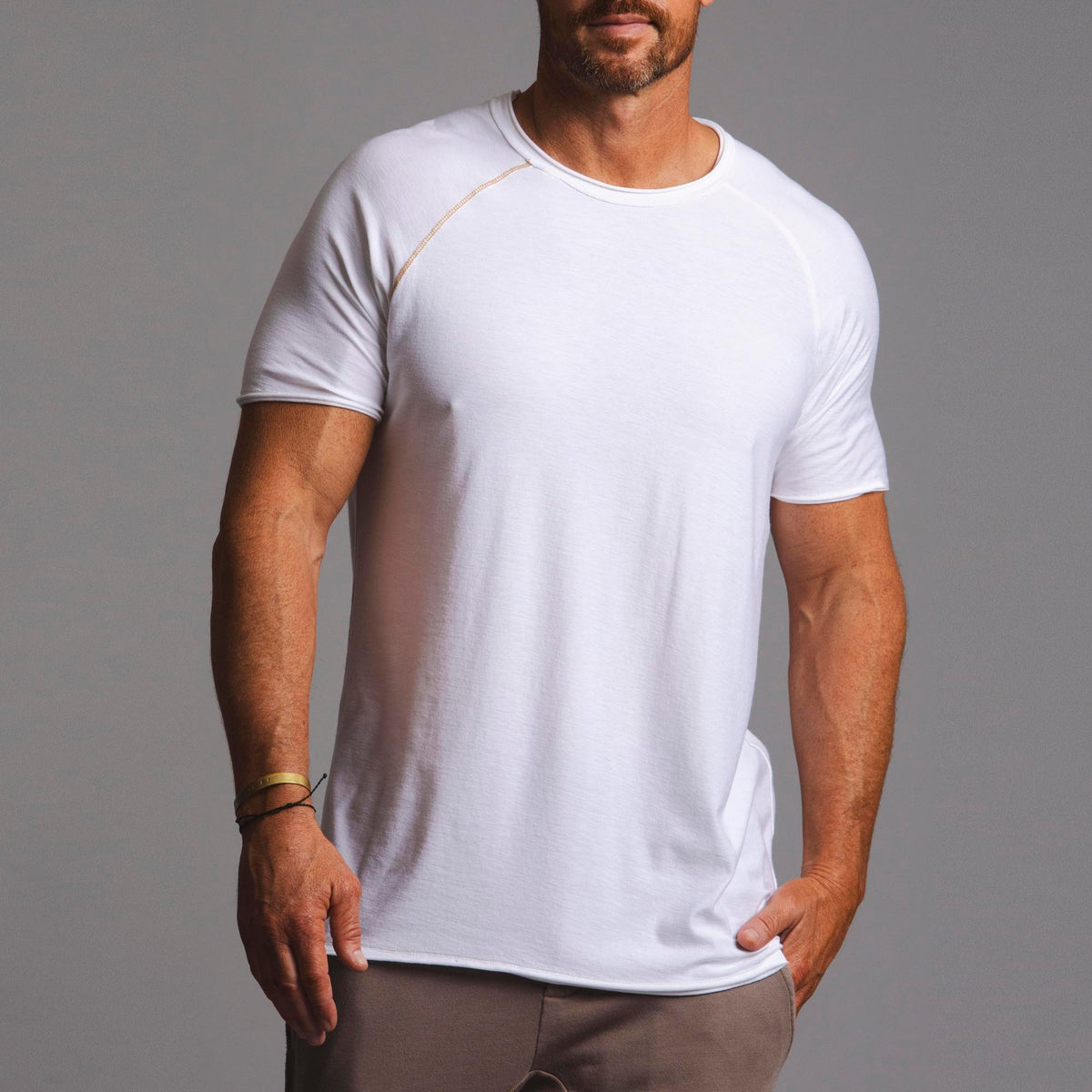 Male modeling white ultimate tree shirt 