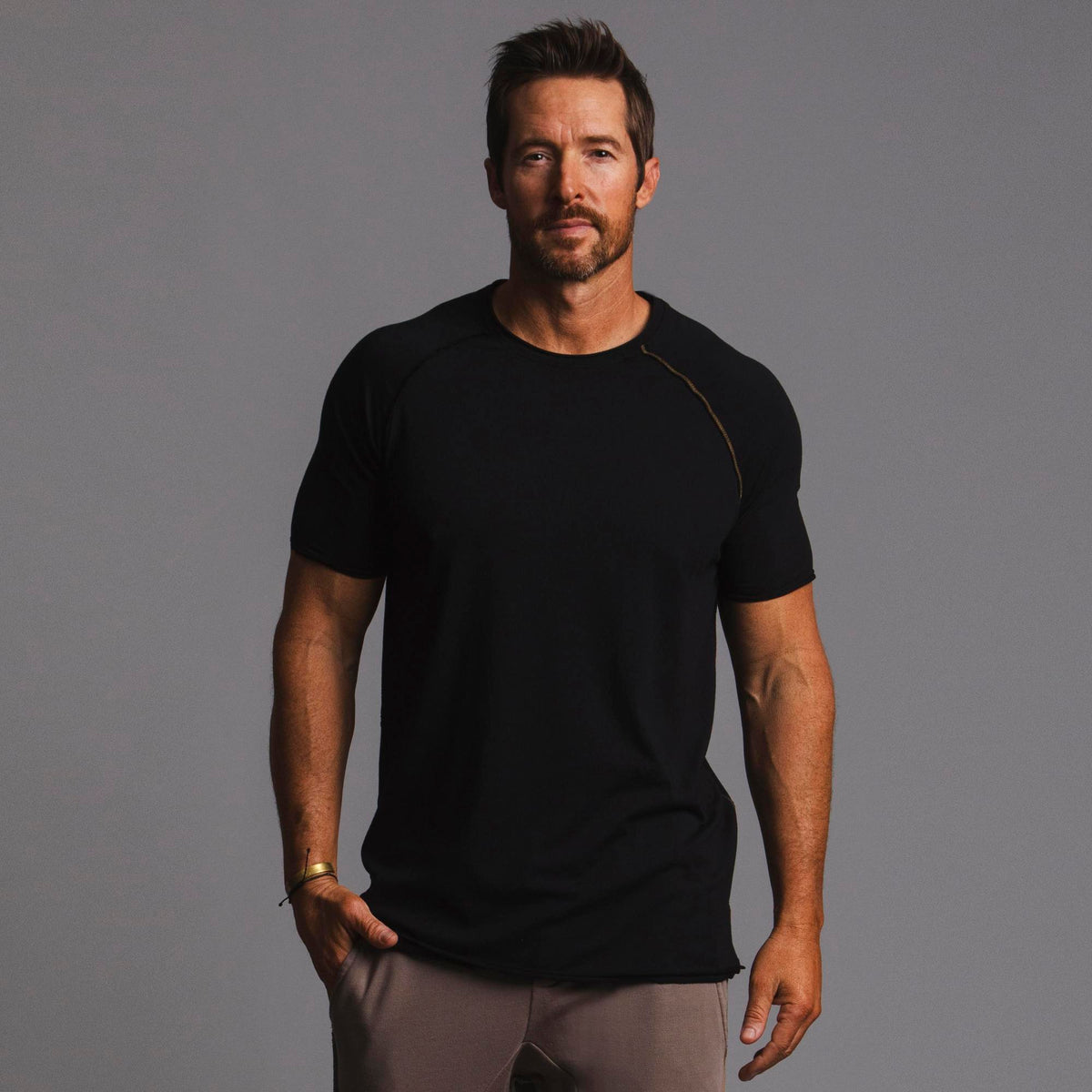 Male modeling black ultimate tee shirt