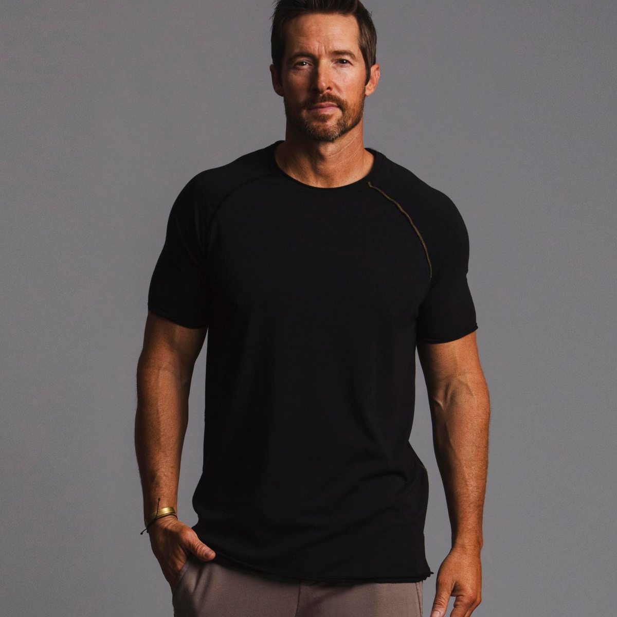 Male modeling black ultimate tee shirt