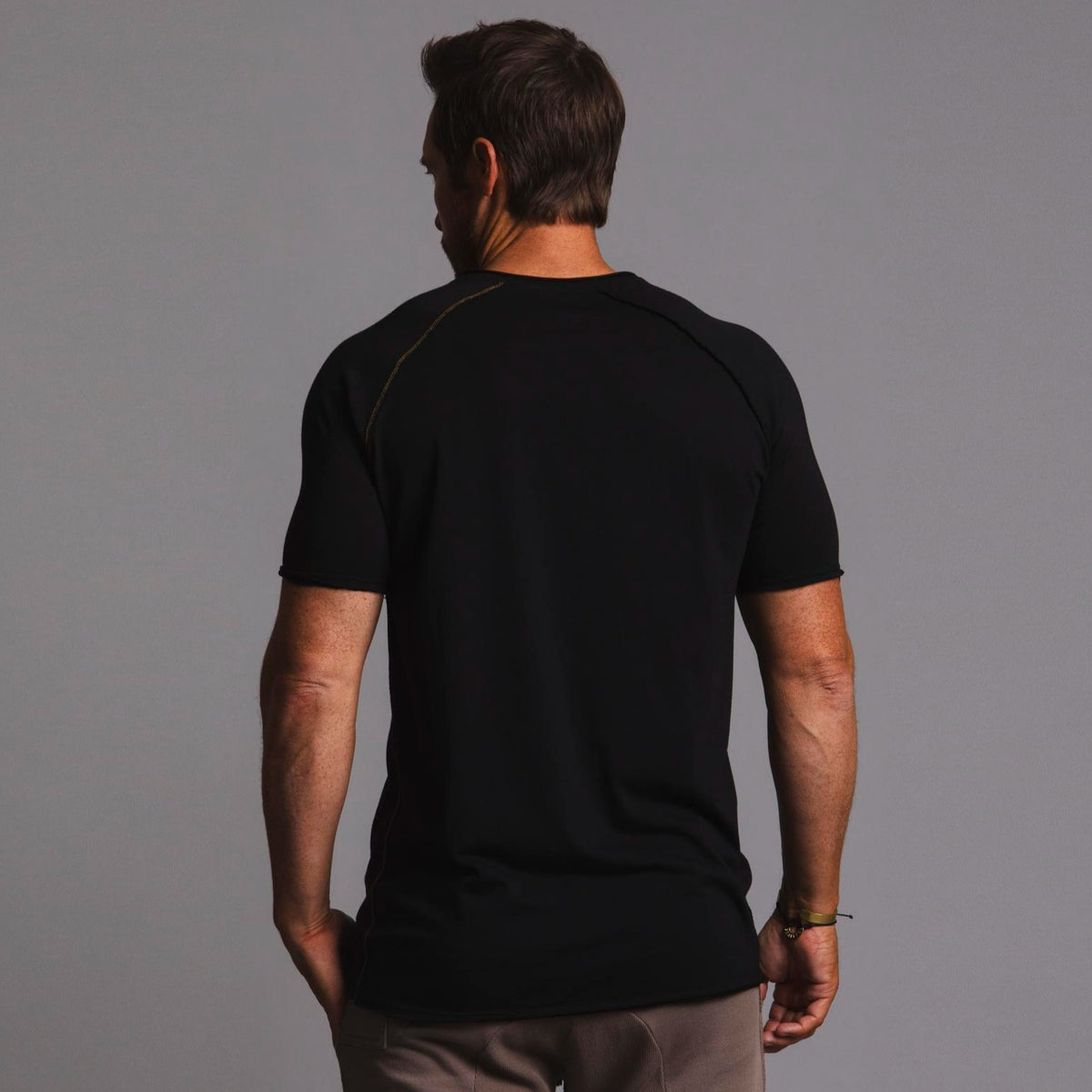 Male modeling black ultimate tee shirt