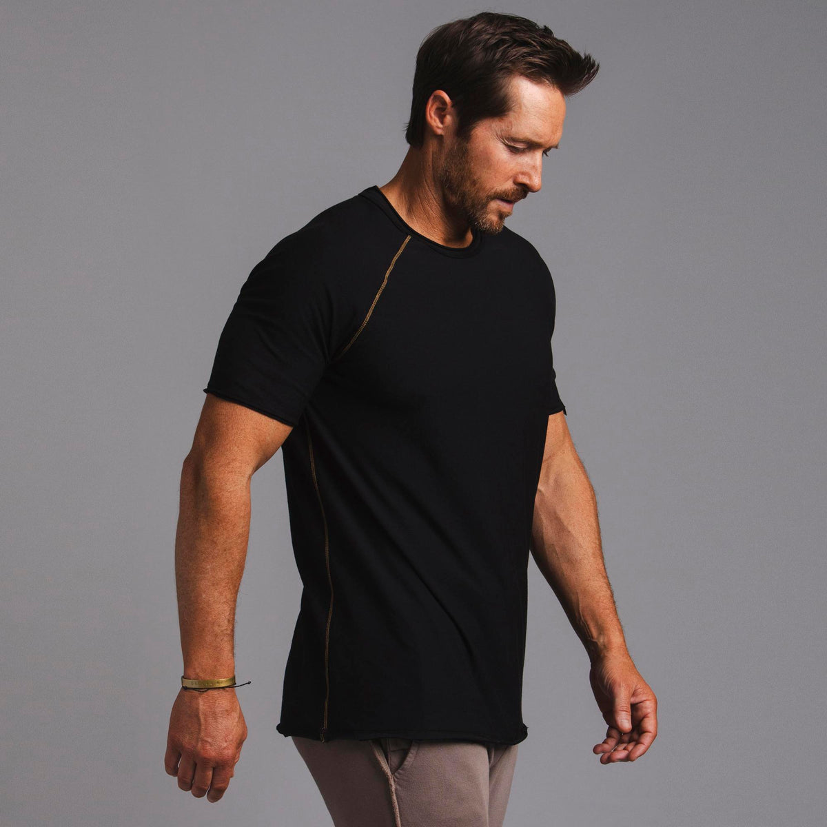 Male modeling black ultimate tee shirt
