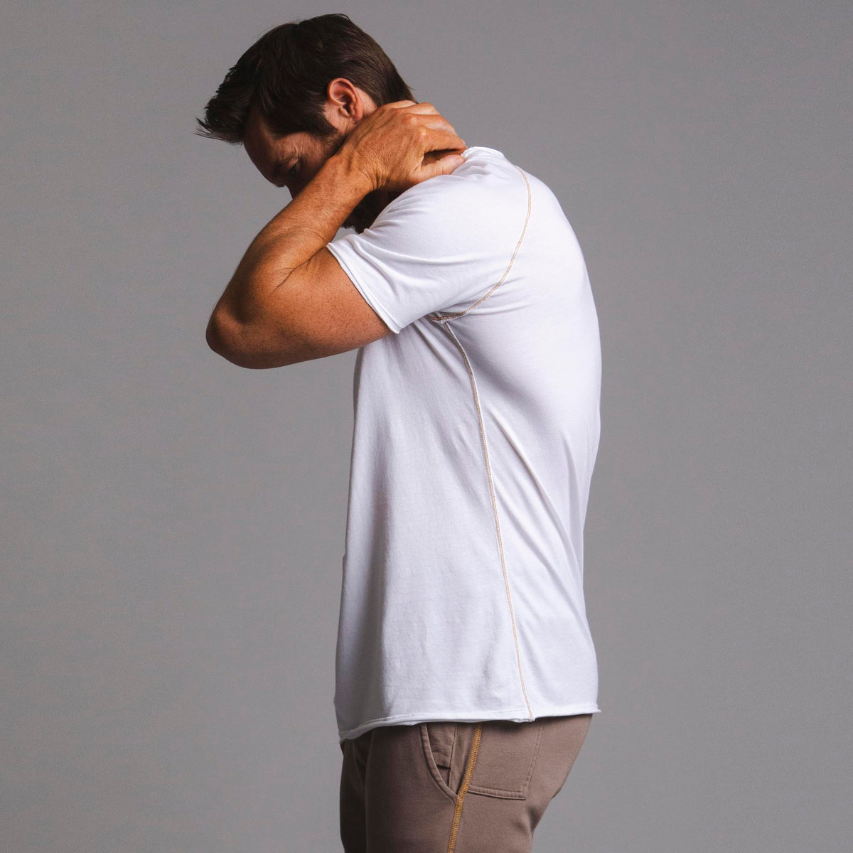 Male modeling white ultimate tee shirt
