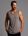 Man modeling a Clay gray tank top