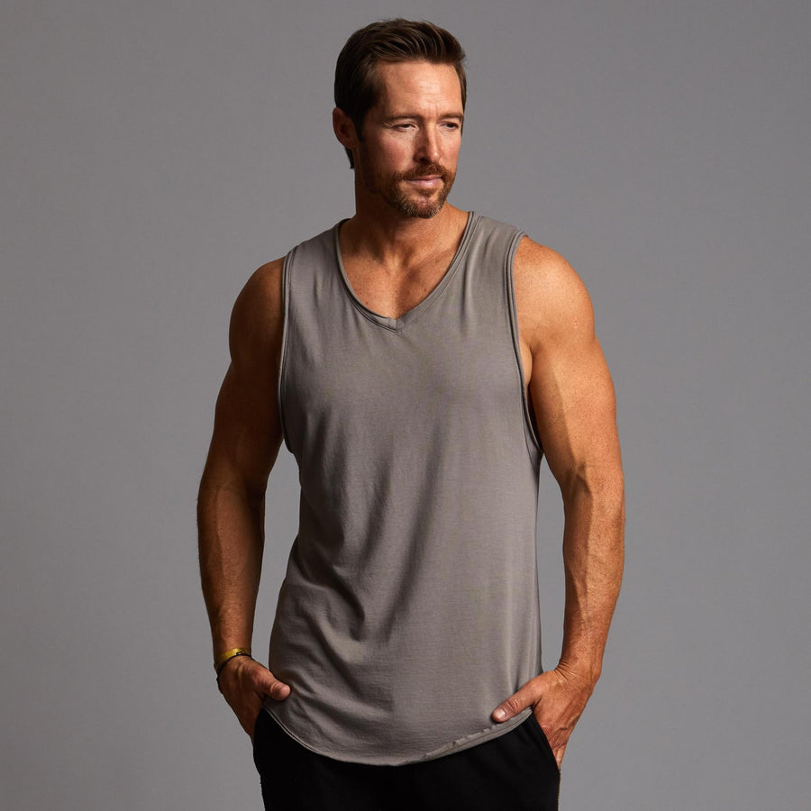 Man modeling a Clay gray tank top