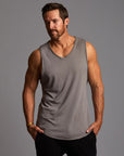 Man modeling a Clay gray tank top