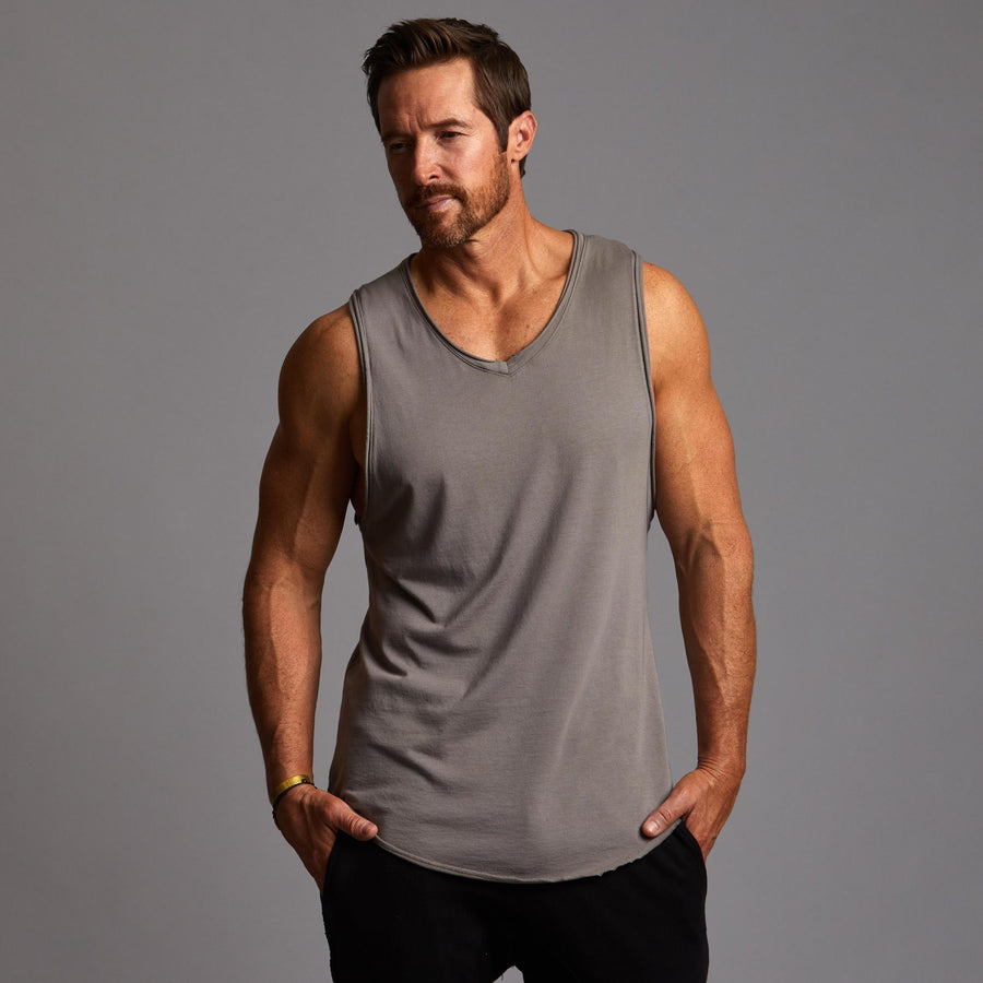 Man modeling a Clay gray tank top