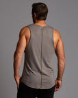 Man modeling a Clay gray tank top