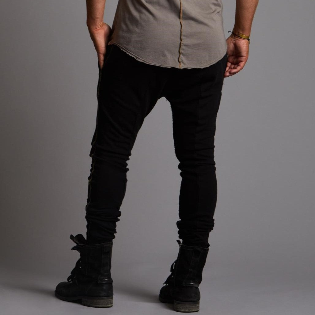 Man modeling the milano pant in black
