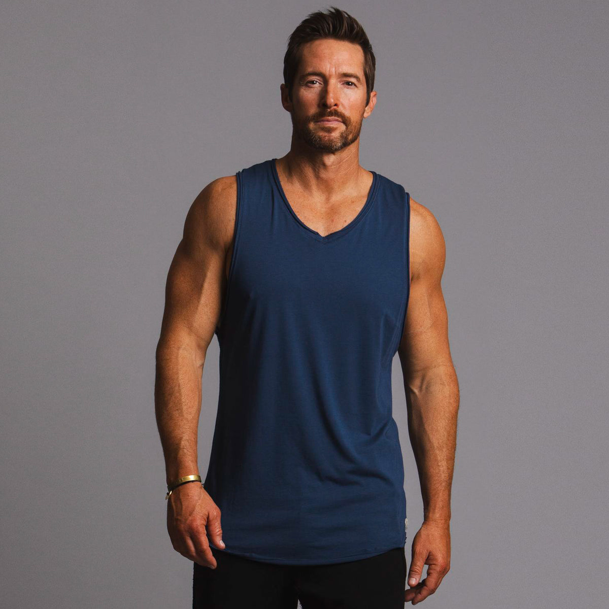 Man modeling a Royal blue tank top
