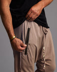 male modeling taupe tree pants
