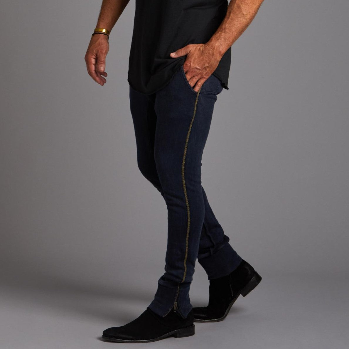 Man modeling the milano pant in charcoal blue