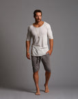 Man modeling a milano mids in deep clay
