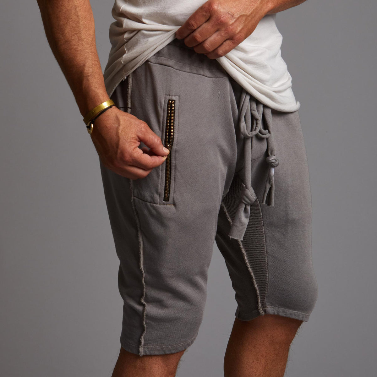 Man modeling a milano mids in deep clay
