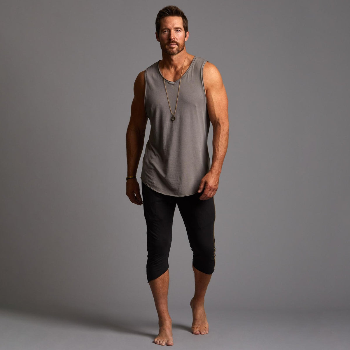 Male modeling Slate gray yogo mid shorts