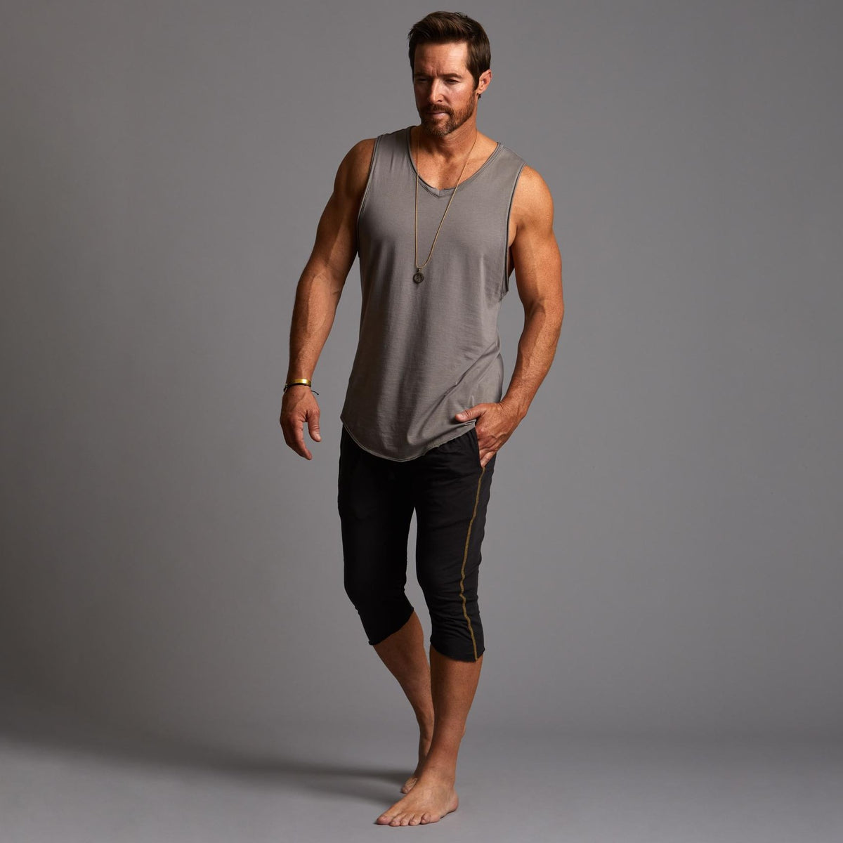 Male modeling Slate gray yogo mid shorts