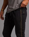 Male modeling black yogo mid shorts