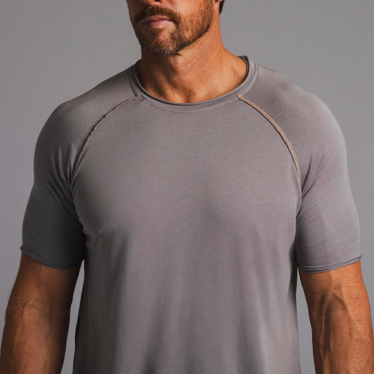 Male modeling tan ultimate tee shirt