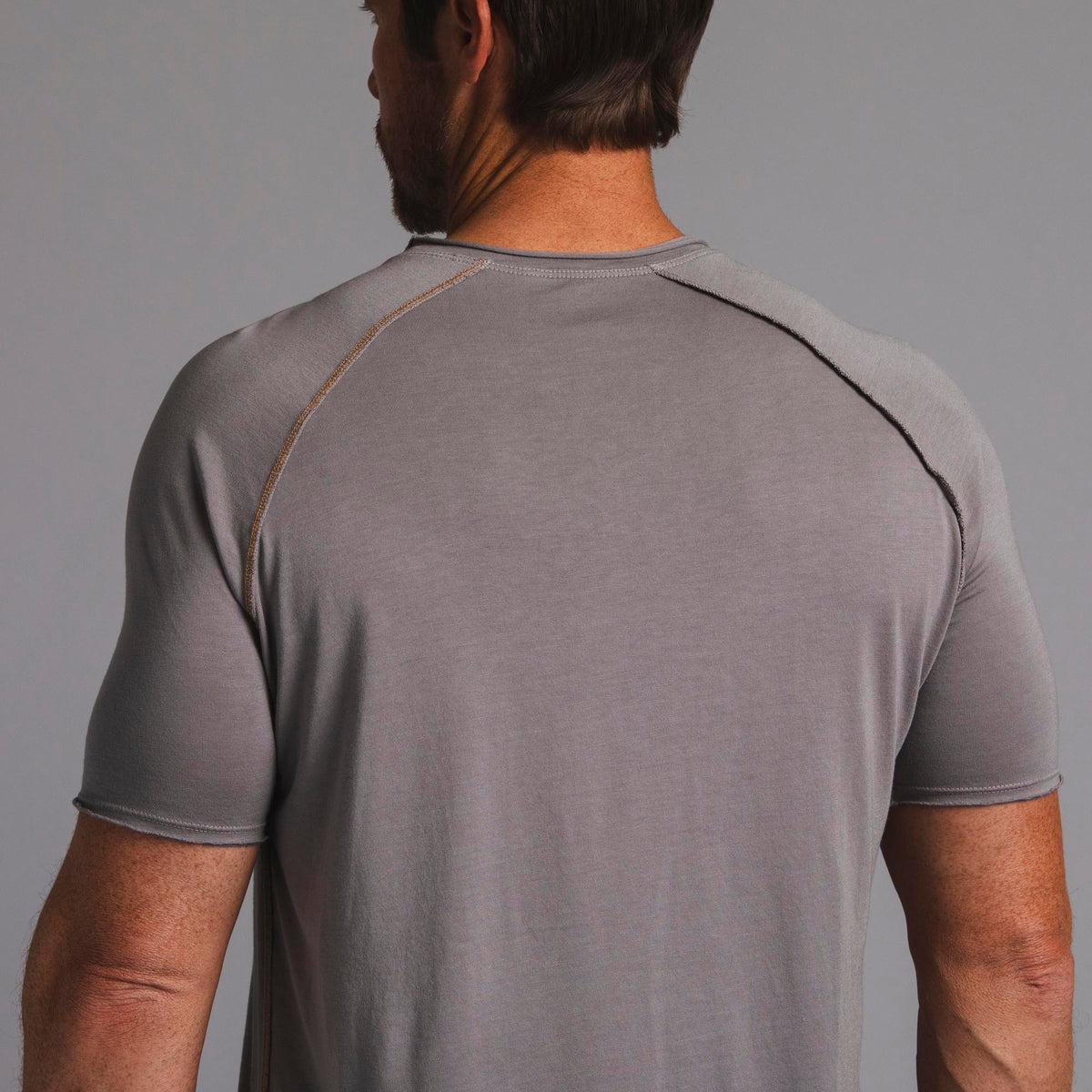Male modeling tan ultimate tee shirt