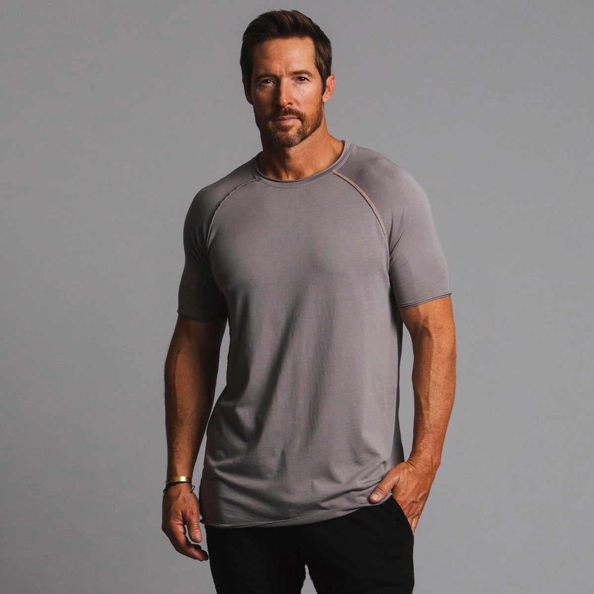 Male modeling tan ultimate tee shirt
